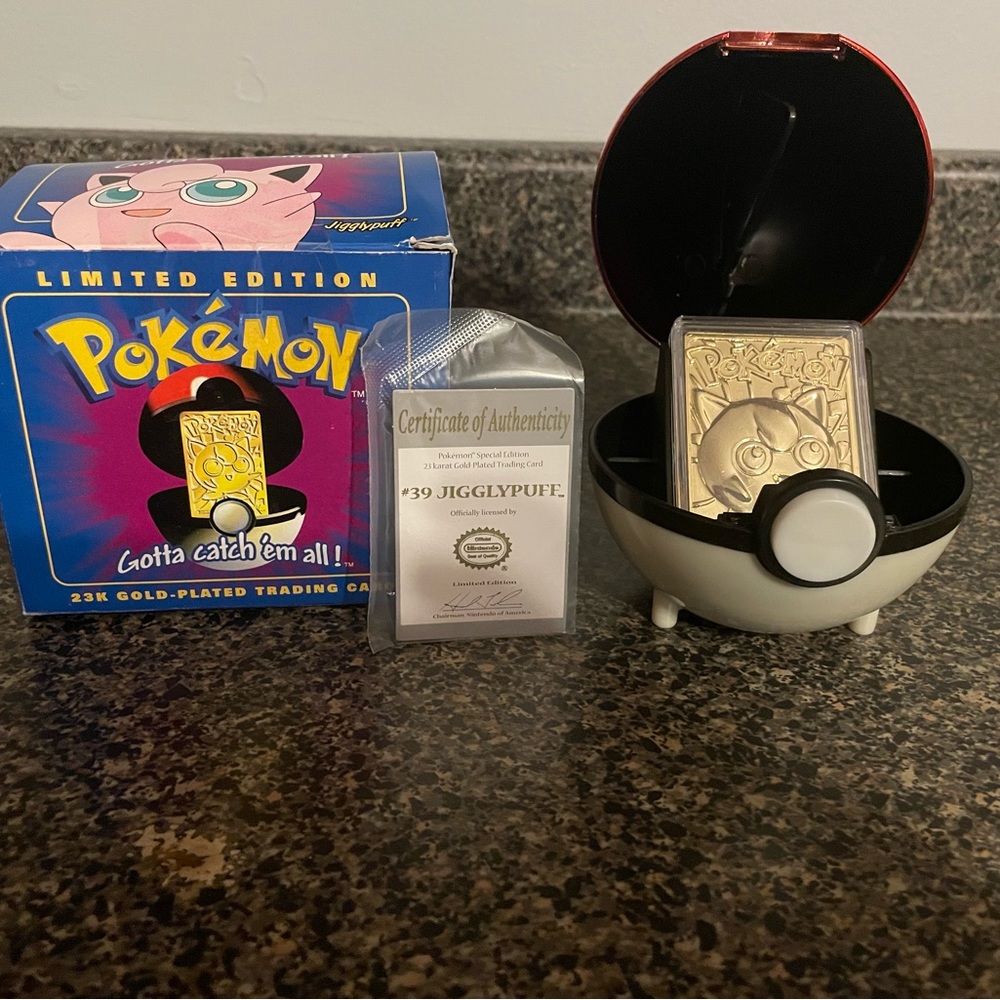 Pokémon gold platted poke ball with authenticity card